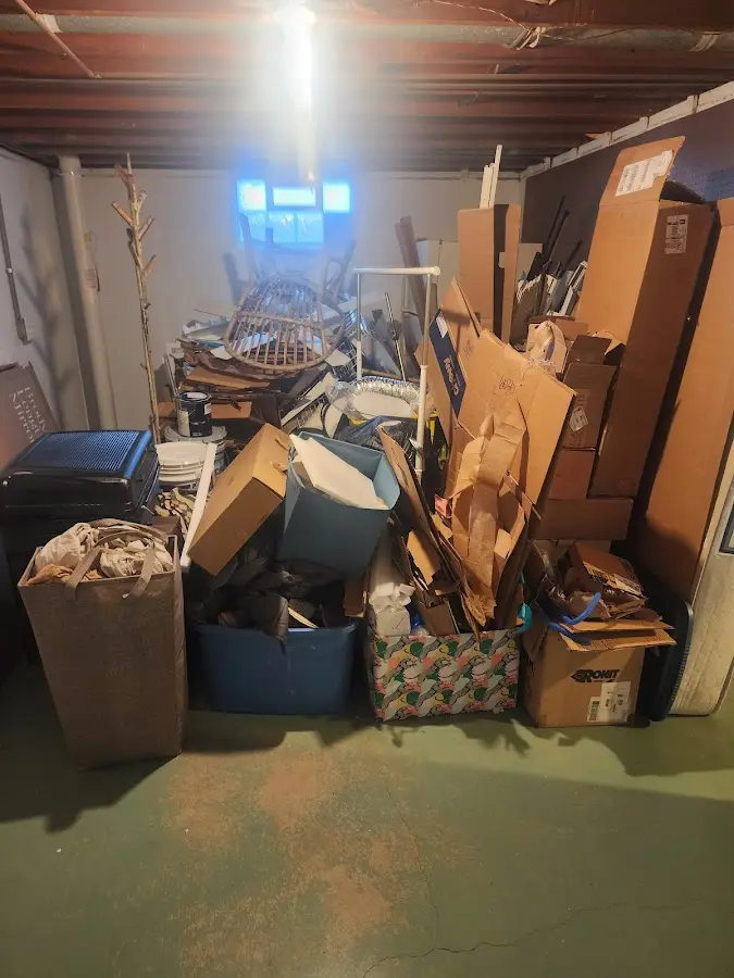 Roll-off dumpster container at job site for 2 Yard Dumpster Rental in Clifton Park